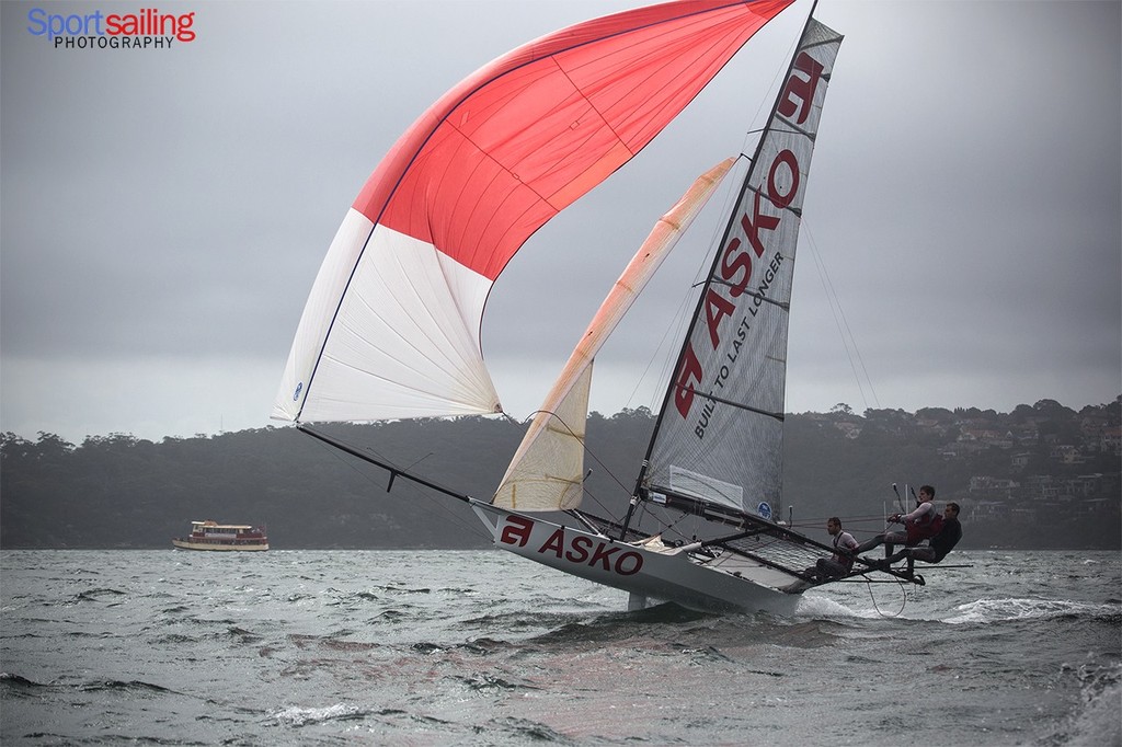 Asko puts on some action heading towards Shark Island  - 18ft Skiff JJ Giltinan Championships2013 - Race 7 © Beth Morley - Sport Sailing Photography http://www.sportsailingphotography.com